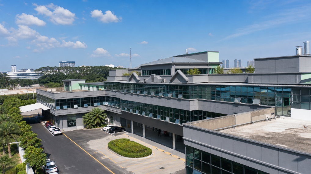 Modern manufacturing facility under a blue sky