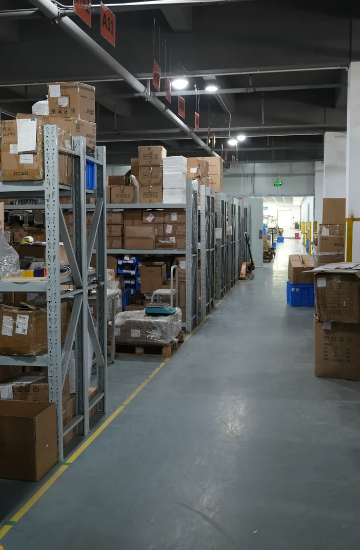 Finished hair dryers prepared for on-time shipment in an organized warehouse